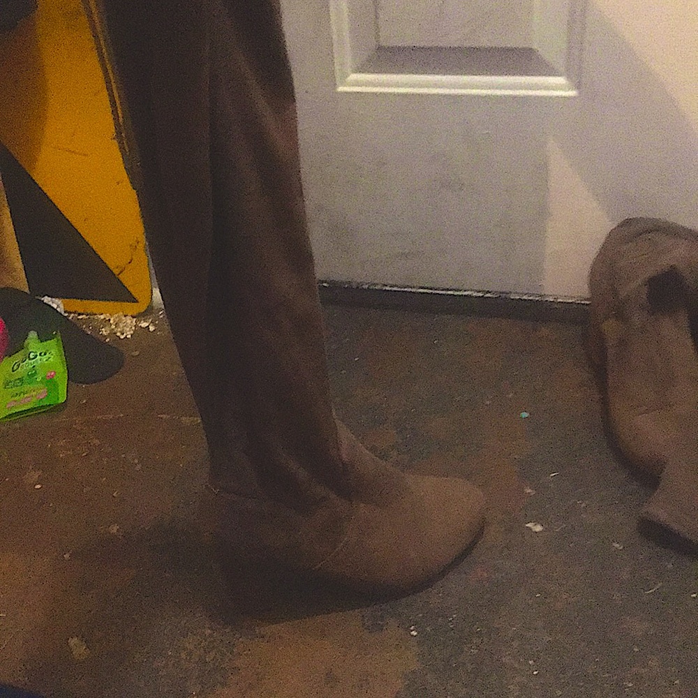 Tan suede knee high heeled boots zips a little bit and has draw strings